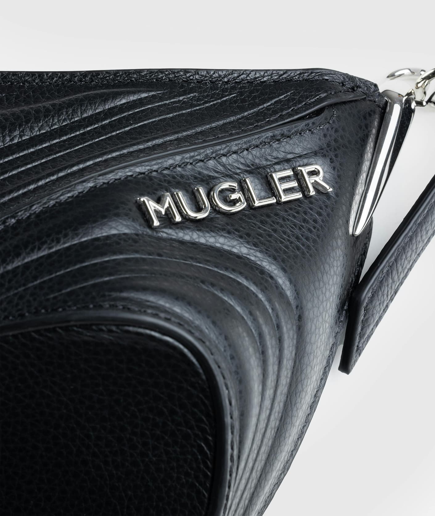 Revised Mugler logo wordmark in use on a campaign visual